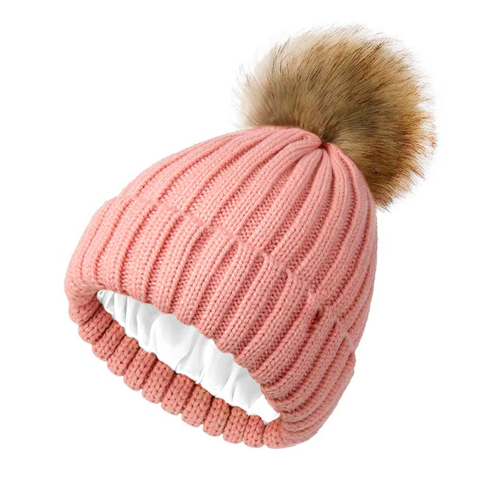 Womens Solid-Color Brimmed Beanie Hat With Satin lining and a Pom-Pom