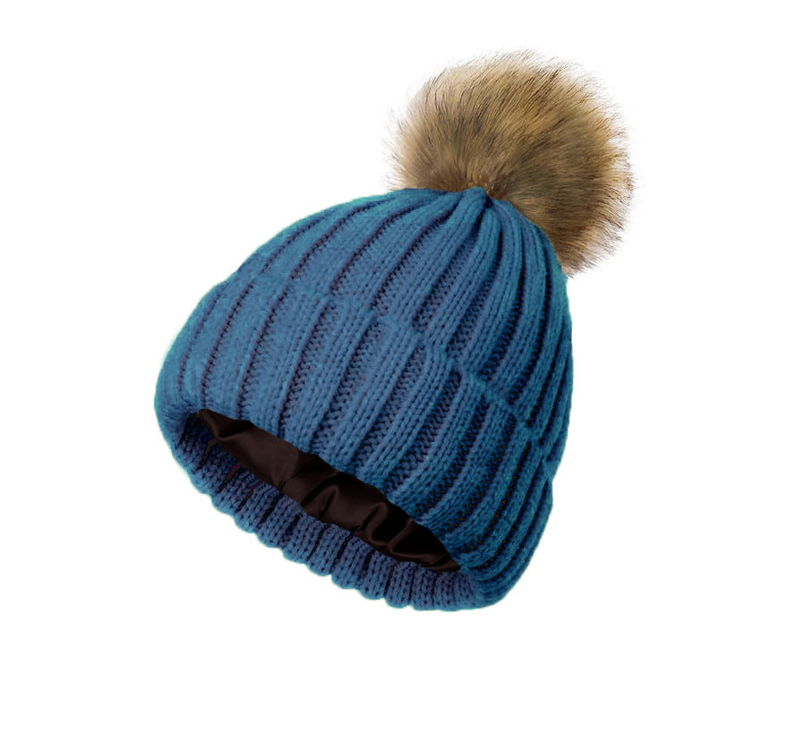 Womens Solid-Color Brimmed Beanie Hat With Satin lining and a Pom-Pom