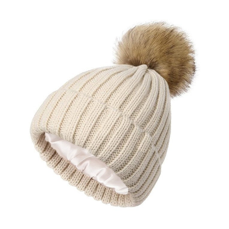 Womens Solid-Color Brimmed Beanie Hat With Satin lining and a Pom-Pom