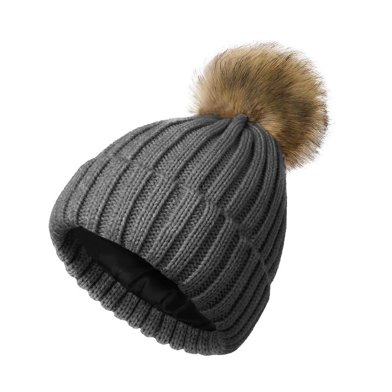 Womens Solid-Color Brimmed Beanie Hat With Satin lining and a Pom-Pom