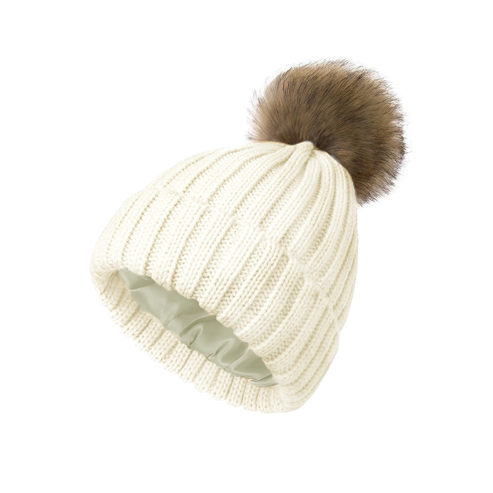 Womens Solid-Color Brimmed Beanie Hat With Satin lining and a Pom-Pom